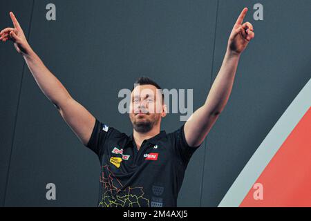 LONDON, UNITED KINGDOM - DECEMBER 16: Florian Hempel of Germany reacts during his First Round match at the 2022/23 Cazoo World Darts Championship at Alexandra Palace on December 16, 2022 in London, United Kingdom. (Photo by Pieter Verbeek/BSR Agency) Stock Photo