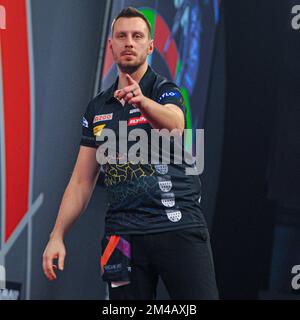 LONDON, UNITED KINGDOM - DECEMBER 16: Florian Hempel of Germany reacts during his First Round match at the 2022/23 Cazoo World Darts Championship at Alexandra Palace on December 16, 2022 in London, United Kingdom. (Photo by Pieter Verbeek/BSR Agency) Stock Photo