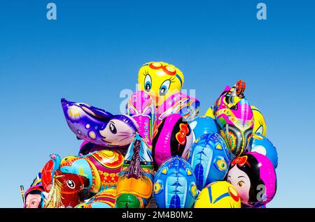 Colorful balloons for sale at the local market in the outskirts of Sibsagar Stock Photo