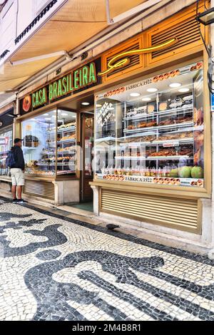 LISBON, PORTUGAL - JUNE 4, 2018: People visit Casa Brasileira bakery in Lisbon. Lisbon is the 11th-most populous urban area in the EU (2.8 million peo Stock Photo