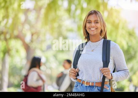 Education, backpack and college with portrait of woman on campus for learning, scholarship and knowledge. Study, future and university with girl Stock Photo