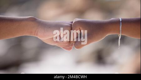 Fist bump, friends and support motivation outdoor for partnership travel holiday or trust vacation. Greeting, friendship agreement and celebrate Stock Photo