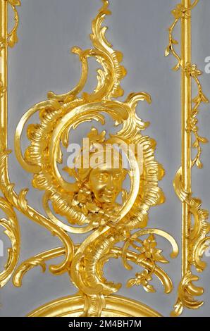 Detail of baroque golden interior decorations in Catherine Palace - Tsarskoye Selo (Pushkin), St. Petersburg, Russia. 24th of June 2011 Stock Photo