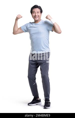 Studio shot of senior Chinese man exercising Stock Photo