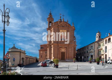 Fossano, Cuneo, Piedmont, Italy - October 03, 2022: The church of the Holy Trinity or Battuti Rossi (beaten reds) in via Roma on blue sky Stock Photo