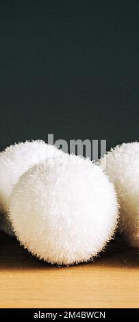 Christmas decorations, white baubles with snow effect. Stock Photo