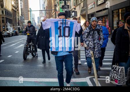 Argentine  football sports fans and their supporters celebrate on Sunday, December 18, 2022 in Midtown Manhattan in New York after Argentina defeats France in an exciting game to win the FIFA World Cup. (© Richard B. Levine) Stock Photo