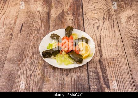 Stuffed vine leaves, sometimes called sarma, are popular, and aubergines, zucchini, spiky squashes, onions, cabbages, squash blossoms, figs, tomatoes, Stock Photo