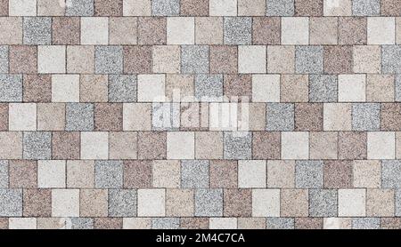 Colorful paving slabs, pedestrian lane paving, top view. Seamless background photo texture Stock Photo