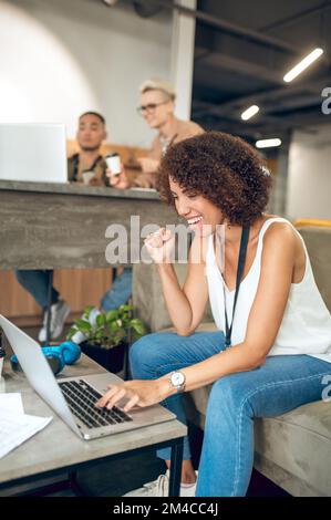 Group of corporate employees performing their job duties Stock Photo