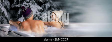 winter spa. couple relaxing in outdoor hot tub. banner with copy space Stock Photo