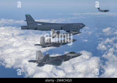 Seoul, South Korea. 20th Dec, 2022. (In this handout photo provided by South Korean Defense Ministry), A U.S. B-52 bomber, C-17 and South Korean Air Force F-35 fighter jets fly over the Korean Peninsula during a joint air drill in South Korea on December 20, 2022. (Handout Photo Korean Defense Ministry via Credit: Sipa USA/Alamy Live News Stock Photo