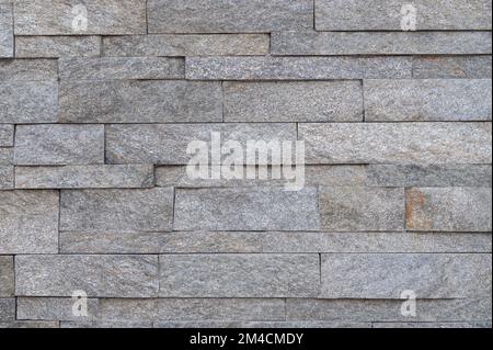Modern stone brick wall tile texture Stock Photo