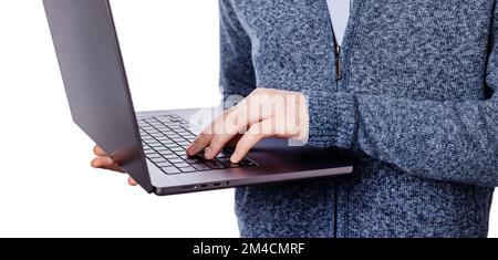 Male in blue sweater holding laptop isolated on white background, closeup Stock Photo