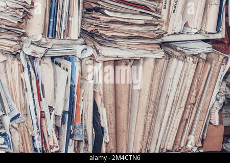 Old paper documents on shelves Stock Photo
