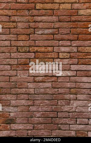 Background photo of an old rugged texturized brick wall Stock Photo