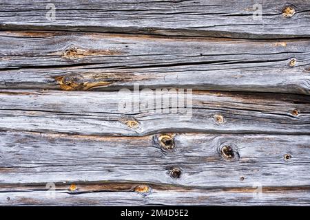 Aged wooden barn beam background with rustic grey wood in Northern Finland Stock Photo