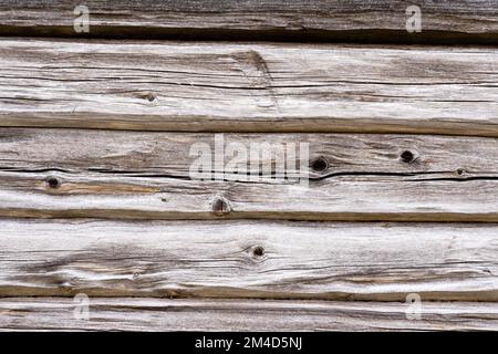 Aged wooden barn beam background with rustic grey wood in Northern Finland Stock Photo