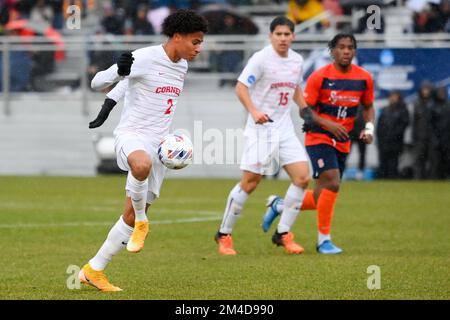 November 27, 2022: Cornell Big Red defender Andrew Johnson (29) heads the  ball against the Syracuse Orange during a third round match of the 2022  NCAA Men's Division I Soccer Championship on