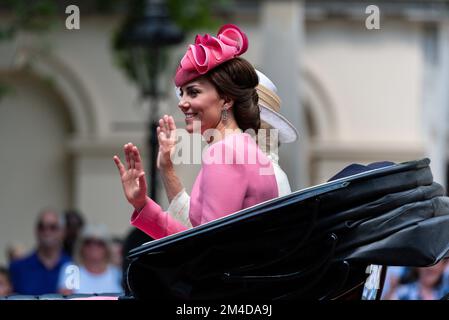 Duchess of Cambridge in a carriage at Trooping the Colour 2017, The Mall, London, UK. Catherine Middleton wearing pink. Displaying ear ring Stock Photo