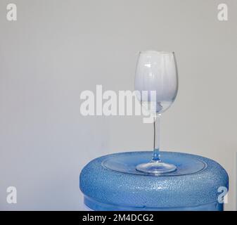 Closeup glass with white fog closeup. Chemical reaction of dry ice with water. Stock Photo