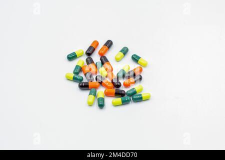 Different medical capsules closeup on wtite background Stock Photo