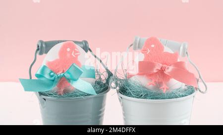 Easter decor with selective focus. Holiday still life with decorative eggs in a buckets with copy space for text Stock Photo
