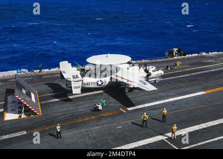 An E-2C Hawkeye prepares to take off from the flight deck of USS Dwight ...