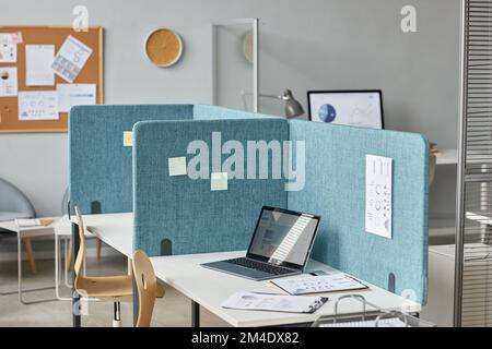 Background image of office interior with workplaces separated by partition walls, cubicles with desks, copy space Stock Photo