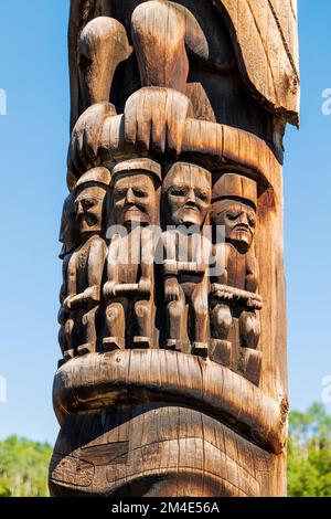 Hand carved cedar totem poles; Gitanyow - Kitwancool Historic Village & Interpretive Center; Gitanyow; British Columbia; Canada Stock Photo