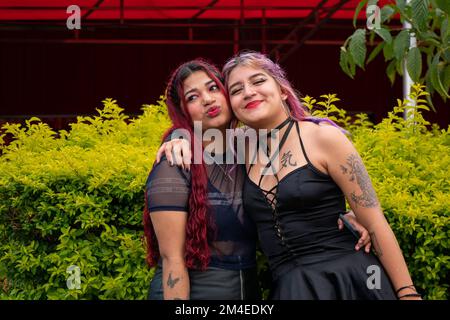 Medellin, Antioquia, Colombia - November 14 2022: Young Colombian Women with are Looking at the Camera Stock Photo