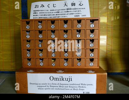 Omikuji (fortune-telling Paper Strip) Tied To A Rope At A Japanese ...