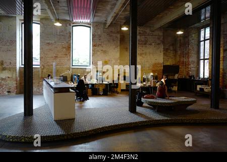 Office in a large abandoned factory in Leipzig Stock Photo