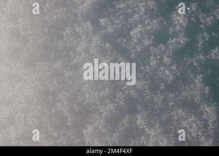 Natural and fresh shiny snow texture winter background. Macro bokeh Stock Photo