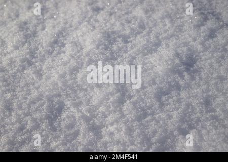 Natural and fresh shiny snow texture winter background. Macro bokeh Stock Photo