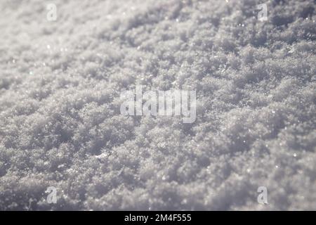 Natural and fresh shiny snow texture winter background. Macro bokeh Stock Photo