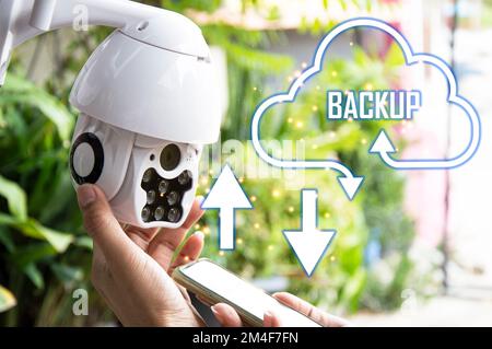 Man installing IP CCTV or high tech surveillance system CCTV system Stock Photo