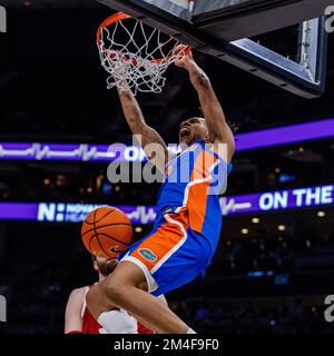 Charlotte, NC, USA. 20th Dec, 2022. Florida Gators guard Will Richard (5) dunks during the second half of the 2022 Jumpman Invitational against the Oklahoma Sooners at Spectrum Center in Charlotte, NC. (Scott Kinser/CSM). Credit: csm/Alamy Live News Stock Photo