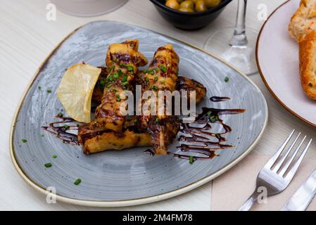 Top view of breaded eggplant or aubergine seasoned with cane honey Stock Photo