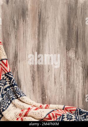 New Year's red, white, blue patterned plaid on a wooden background Stock Photo