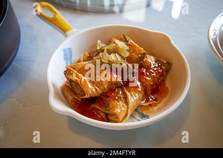 A classic and delicious Cantonese morning tea, steamed bean curd skin rolls Stock Photo