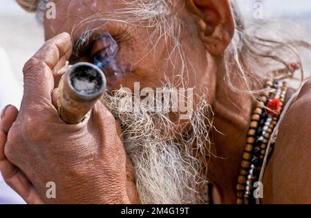 Smoking marihuana is illegal in India, but nobody cares during the Kumbha Mela Stock Photo