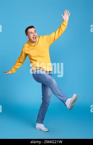 happy funny young man in casual clothes posing Stock Photo
