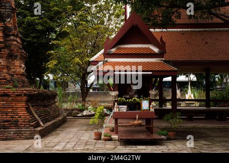 Ancient hermit or antique ruin eremite statues in shrine for thai people travel visit respect praying blessing holy myth mystery at Wat Phu Khao Thong Stock Photo