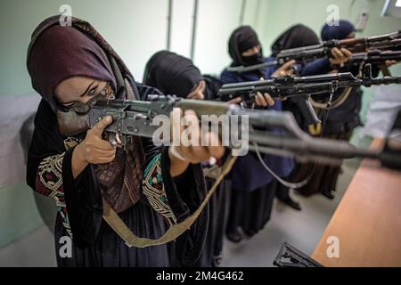 Kabul, Afghanistan. 17th Nov, 2022. Women are trained to use machine guns as part of their training as police officers. When they took power in August 2021, the Taliban massively restricted women's rights. Girls' schools from the seventh grade onward have been closed in large parts of the country, and women have largely been pushed out of the workforce. In December, the Taliban also announced it would ban women from entering universities. (to dpa 'Afghanistan's women: One setback after another') Credit: Oliver Weiken/dpa/Alamy Live News Stock Photo