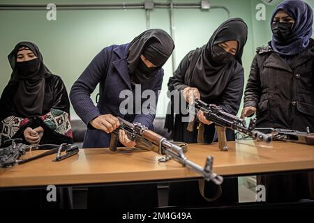 Kabul, Afghanistan. 17th Nov, 2022. Women are trained to use machine guns as part of their training as police officers. When they took power in August 2021, the Taliban massively restricted women's rights. Girls' schools from the seventh grade onward have been closed in large parts of the country, and women have largely been pushed out of the workforce. In December, the Taliban also announced it would ban women from entering universities. (to dpa 'Afghanistan's women: One setback after another') Credit: Oliver Weiken/dpa/Alamy Live News Stock Photo