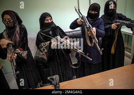 Kabul, Afghanistan. 17th Nov, 2022. Women are trained to use machine guns as part of their training as police officers. When they took power in August 2021, the Taliban massively restricted women's rights. Girls' schools from the seventh grade onward have been closed in large parts of the country, and women have largely been pushed out of the workforce. In December, the Taliban also announced that it would ban women from entering universities. Credit: Oliver Weiken/dpa/Alamy Live News Stock Photo