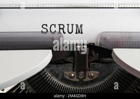 word SCRUM written on old typewriter, business concept Stock Photo