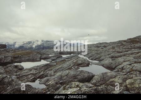 Ponds on rocky mountain slope landscape photo Stock Photo