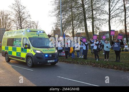 Nurses and supporters outside Kettering General hospital are on strike for the second time within a week, as talks continue after their 19% pay rise demand. The strikers here were more subdued today out of respect for fellow NHS nurse Anju Asok, who along with son Jeeva Saju and daughter Janvi Saju, were murdered last week. Anju been working at Kettering General Hospital since last year, and her colleagues have a memory table with a candle and flowers for her close to the picket line. The RCN (Royal College of Nursing), called the strike action. Stock Photo